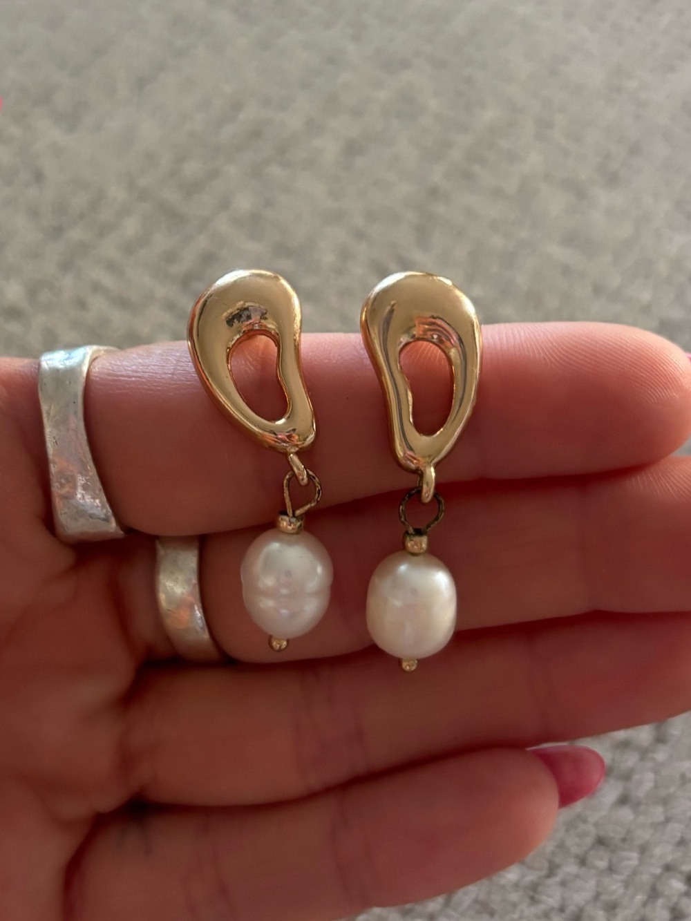 Gold earrings with white pearl drop